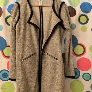 Knee length black and white sweater